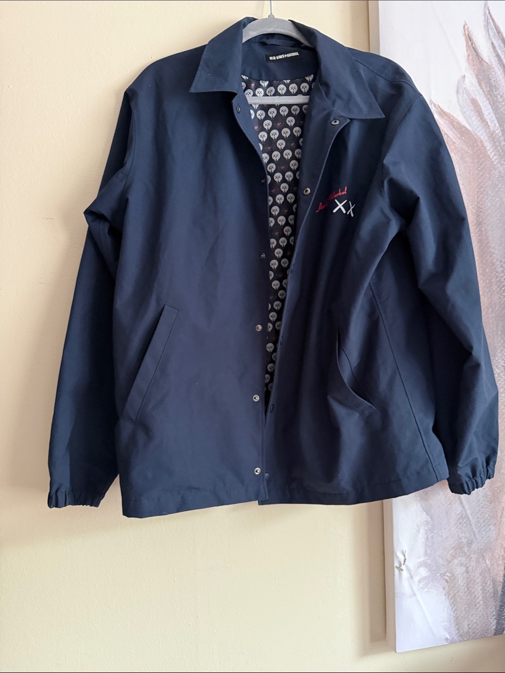 Uniqlo x KAWS Navy Windbreaker with Patterned Lining